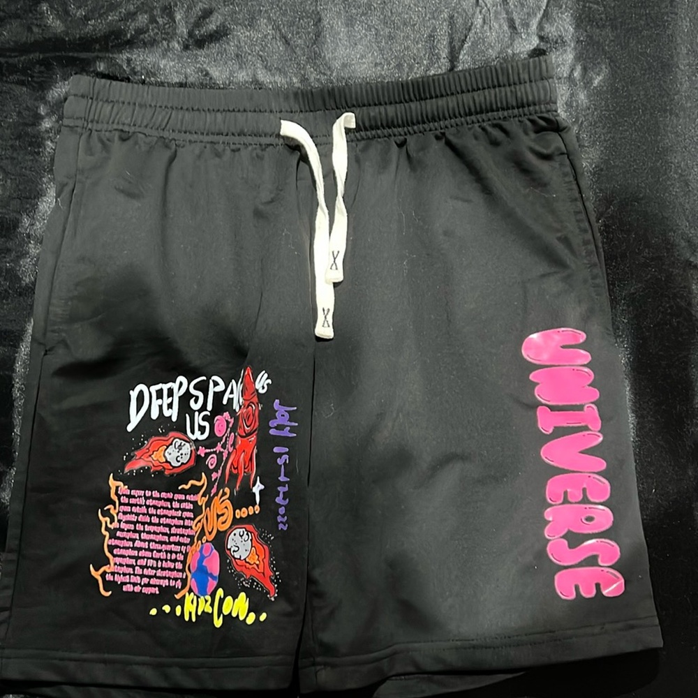 black shorts with space designs
